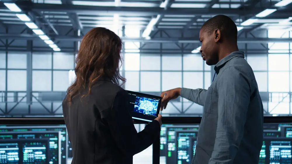 Industrial equipment professionals discussing test and measurement instruments