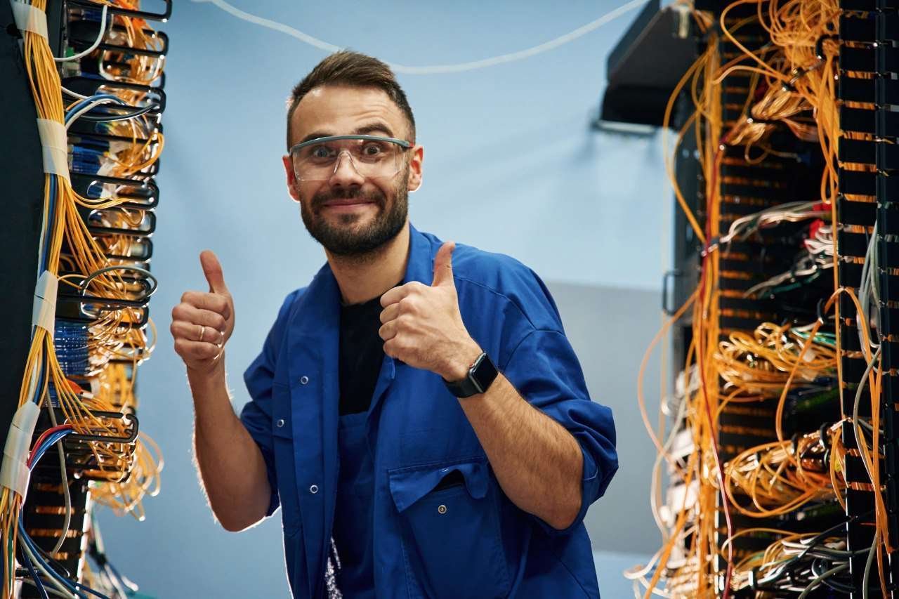 Industrial equipment professionals discussing test and measurement instruments